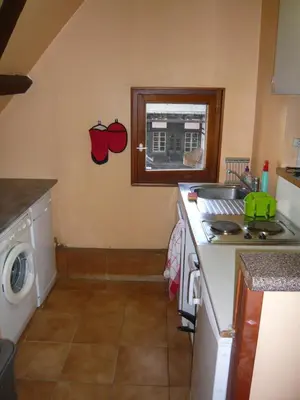 Cuisine ou kitchenette dans l'établissement La cour des meuniers - le Froment et l'Epeautre