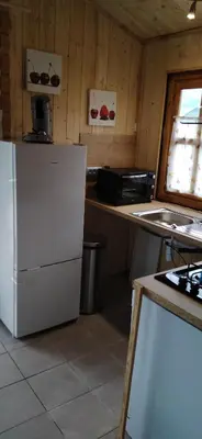 Cuisine ou kitchenette dans l'établissement chalets les 5 loups