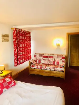 Un ou plusieurs lits dans un hébergement de l'établissement L'Auberge au Bord du Lac