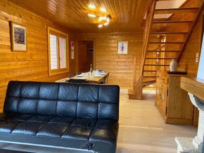 Coin salon dans l'établissement Chalet Sapin