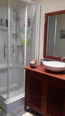 Salle de bains dans l'établissement Le grivé