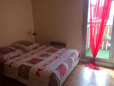 Un ou plusieurs lits dans un hébergement de l'établissement Appartement vue sur lac