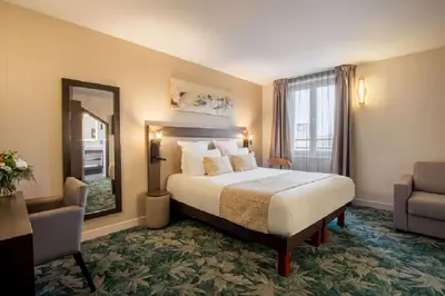 Un ou plusieurs lits dans un hébergement de l'établissement Best Western Plus Hôtel Belfort Centre Gare