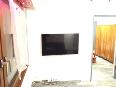 Télévision ou salle de divertissement dans l'établissement Le Gite du Pont
