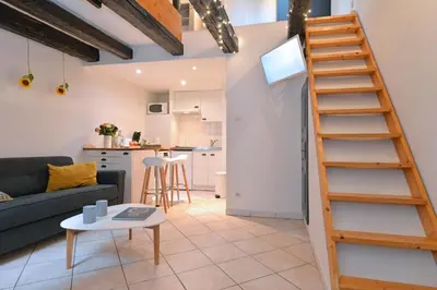 Coin salon dans l'établissement Appartement La Terrasse sur cour