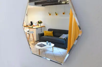 Coin salon dans l'établissement Appartement La Terrasse sur cour