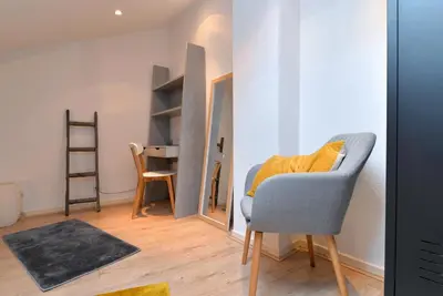 Coin salon dans l'établissement Appartement La Terrasse sur cour