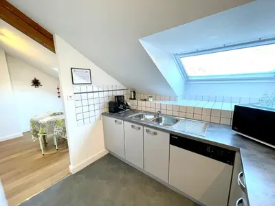 Cuisine ou kitchenette dans l'établissement L'Ourson