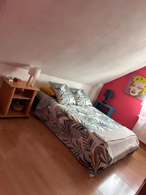 Un ou plusieurs lits dans un hébergement de l'établissement maison privée offre chambre hôte