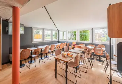 Coin salon dans l'établissement B&B HOTEL Mulhouse Sausheim