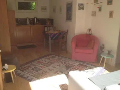 Coin salon dans l'établissement Gite des 3 cigognes