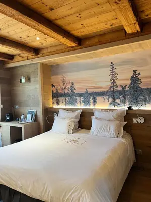 Un ou plusieurs lits dans un hébergement de l'établissement Hôtel-Restaurant Les Bas-Rupts, Singuliers Hôtel