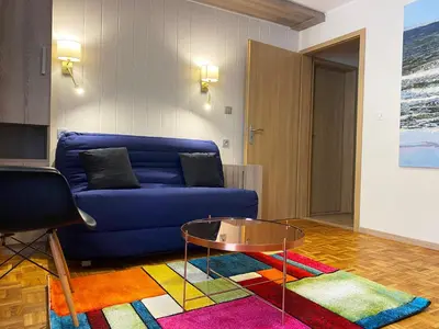 Coin salon dans l'établissement Laterale Residences Riquewihr