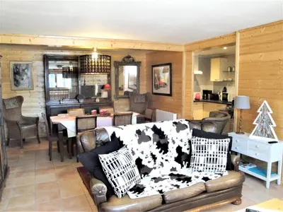 Coin salon dans l'établissement Appartement spacieux à Xonrupt-Longemer + Sauna