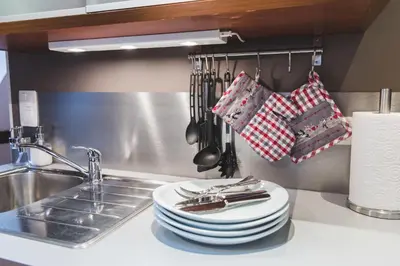 Cuisine ou kitchenette dans l'établissement Hissla Riquewihr Apartments