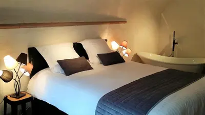 Un ou plusieurs lits dans un hébergement de l'établissement MY SWEET HOMES - STUDIO 