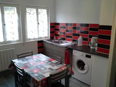 Cuisine ou kitchenette dans l'établissement Chalet aux 2 sapins