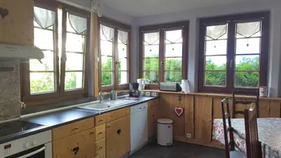 Cuisine ou kitchenette dans l'établissement Chalet La Zaubette 8 personnes