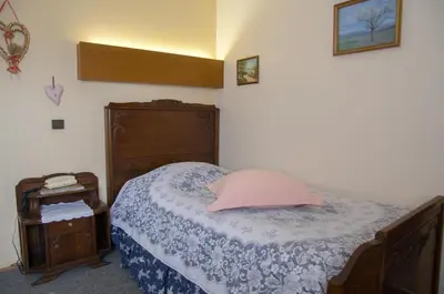 Un ou plusieurs lits dans un hébergement de l'établissement Hôtel de Bâle