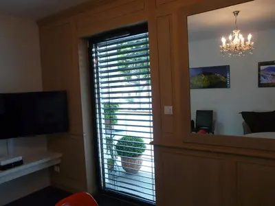 Télévision ou salle de divertissement dans l'établissement Saint Germain