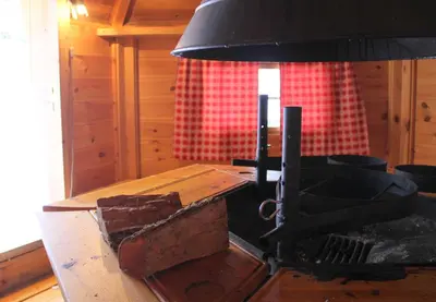 Coin salon dans l'établissement Chalet centaurée - Rémy HEROLD