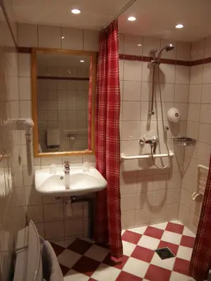 Salle de bains dans l'établissement Caveau de l'ami Fritz