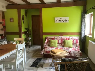 Coin salon dans l'établissement Gîte La Petite Finlande