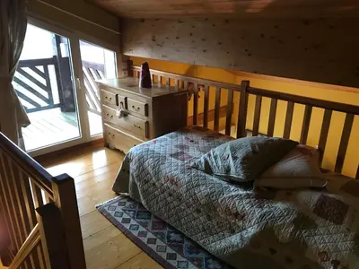 Un ou plusieurs lits dans un hébergement de l'établissement Les Loges du Lac - Appartement avec Terrasse