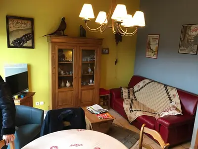 Coin salon dans l'établissement Les Loges du Lac - Appartement avec Terrasse