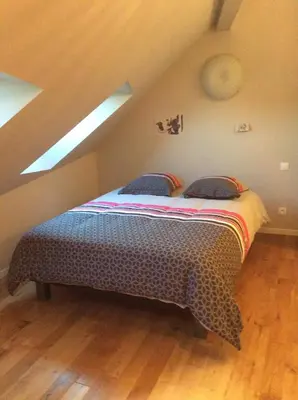 Un ou plusieurs lits dans un hébergement de l'établissement Gîte Le Faucon Pèlerin