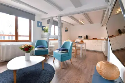 Coin salon dans l'établissement Appartement L'Authentique de la Petite Venise