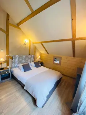 Un ou plusieurs lits dans un hébergement de l'établissement Le Chalet d'Etienne