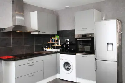 Cuisine ou kitchenette dans l'établissement Gite-les-myrtilles