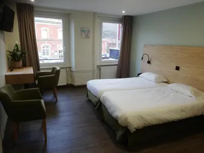 Un ou plusieurs lits dans un hébergement de l'établissement Hôtel Restaurant Le Moschenross