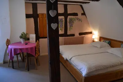 Un ou plusieurs lits dans un hébergement de l'établissement Hôtel le Saint Nicolas