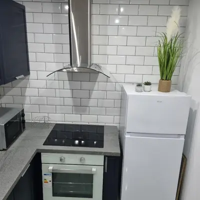 Cuisine ou kitchenette dans l'établissement Les Hirondelles