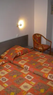 Un ou plusieurs lits dans un hébergement de l'établissement Hôtel du Ladhof