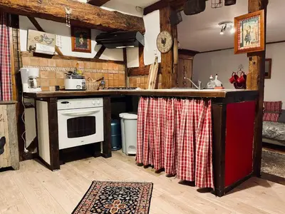 Cuisine ou kitchenette dans l'établissement Gîte Le Chemin de Ronde