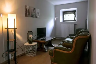 Coin salon dans l'établissement Gîte à La Montagne