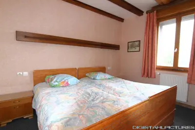 Un ou plusieurs lits dans un hébergement de l'établissement Gîte à La Montagne