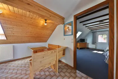 Un ou plusieurs lits dans un hébergement de l'établissement Gîte à La Montagne