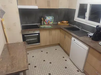 Cuisine ou kitchenette dans l'établissement Maison chaleureuse La Meybel
