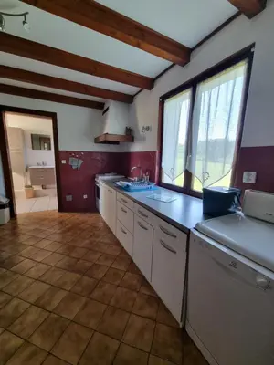 Cuisine ou kitchenette dans l'établissement La Mauselaine