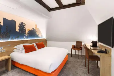 Télévision ou salle de divertissement dans l'établissement Hotel KLE, BW Signature Collection