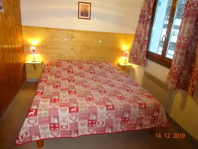 Un ou plusieurs lits dans un hébergement de l'établissement La Bresse Hautes Vosges Chalet 