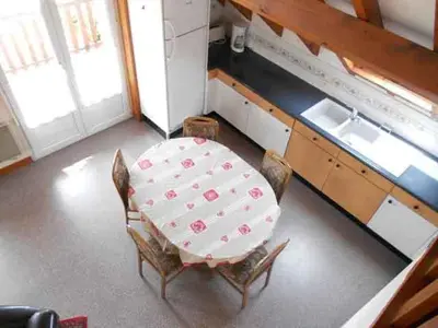 Cuisine ou kitchenette dans l'établissement Résidence du Chajoux