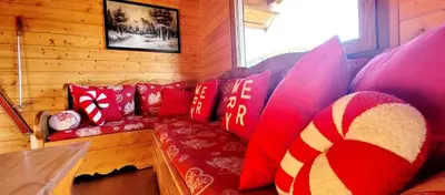 Coin salon dans l'établissement Chalet de la Grimpette au coeur de Gérardmer