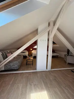 Coin salon dans l'établissement L'Appart Sélestadien
