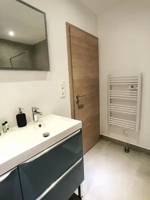 Salle de bains dans l'établissement Au p'tit Cordonnier