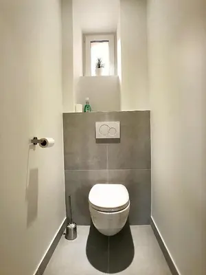 Salle de bains dans l'établissement Au p'tit Cordonnier